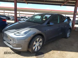 2023 Tesla Model Y Long Range with VIN 7SAYGDEE4PF875915, listed as a IAAI auction lot 42095178 with 11,928 mi miles and . Bid and sale history available at DreamBid. Image 19.