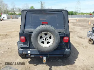 2006 Jeep Wrangler Sport with VIN 1J4FA49S76P718349, listed as a IAAI auction lot 42098356 with 137,804 mi miles and . Bid and sale history available at carsss.com. Image 16.