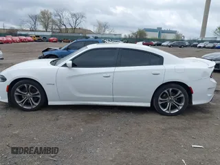 2020 Dodge Charger R/T with VIN 2C3CDXCT5LH197848, listed as a IAAI auction lot 41918921 with 57,036 mi miles and . Bid and sale history available at DreamBid. Image 14.