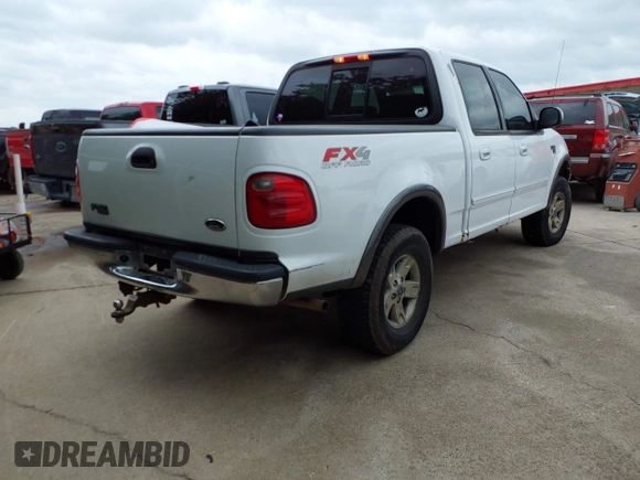 2002 Ford F-150 XLT with VIN 1FTRW08L02KE29411, listed as a IAAI auction lot 42133550 with 270,752 mi miles. Bid and sale history available at carsss.com. Image 4.