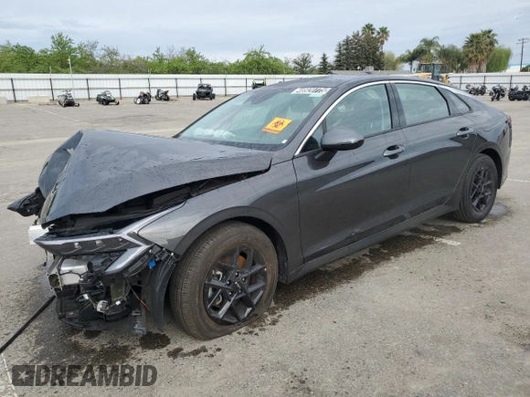 2025 Kia K5 LXS with VIN KNAG24J77S5320351, listed as a Copart auction lot 48920775 with 3,150 mi miles and Salvage Title. Bid and sale history available at carsss.com. Image 1.