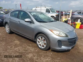 2012 Mazda 3 i Sport with VIN JM1BL1UF4C1535447, listed as a IAAI auction lot 42073084 with 121,185 mi miles and . Bid and sale history available at DreamBid. Image 1.