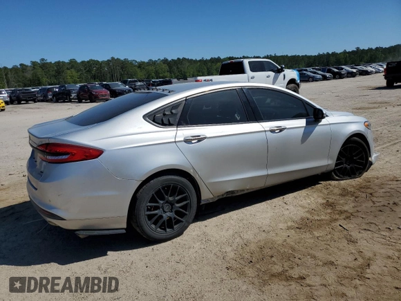 2017 Ford Fusion SE z VIN 3FA6P0HD7HR184691, wystawiony jako Copart lot #52515085 z przebiegiem 113 275 mil mil oraz Szkoda całkowita • Salvage title. Historia ofert i sprzedaży dostępna na DreamBid. Obrazek 3.