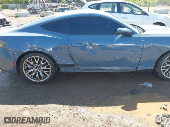 2024 Ford Mustang EcoBoost with VIN 1FA6P8TH8R5140468, listed as a IAAI auction lot 42157511 with 9,559 mi miles and . Bid and sale history available at DreamBid. Image 6.