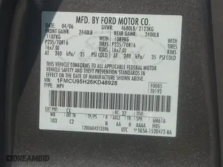 2006 Ford Escape Hybrid with VIN 1FMCU95H26KD48928, listed as a IAAI auction lot 41665769 with 173,313 mi miles. Bid and sale history available at carsss.com. Image 9.