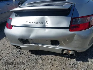 2006 Porsche 911 Carrera S z VIN WP0CB29976S766616, wystawiony jako IAAI lot #42119525 z przebiegiem 57 164 mil mil oraz . Historia ofert i sprzedaży dostępna na DreamBid. Obrazek 6.