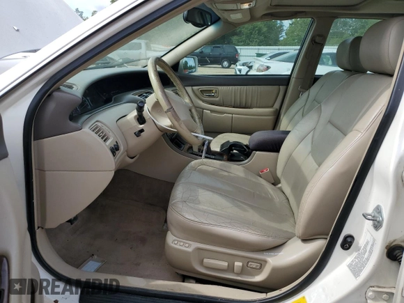 2001 Toyota Avalon XL z VIN 4T1BF28B91U155354, wystawiony jako Copart lot #52393885 z przebiegiem 277 545 mil mil oraz Szkody całkowita. Historia ofert i sprzedaży dostępna na DreamBid. Obrazek 7.