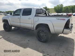 2012 Toyota Tacoma with VIN 5TFLU4ENXCX027960, listed as a Copart auction lot 60689025 with 209,480 mi miles and Salvage title. Bid and sale history available at DreamBid. Image 2.