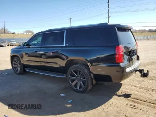 2015 Chevrolet Suburban LTZ with VIN 1GNSKKKC2FR634654, listed as a Copart auction lot 50337415 with 150,255 mi miles and Salvage Title. Bid and sale history available at DreamBid. Image 2.