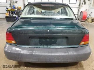 1996 Saturn SL with VIN 1G8ZH5284TZ379272, listed as a Copart auction lot 72447734 with 73,264 mi miles and Non Repairable. Bid and sale history available at carsss.com. Image 6.