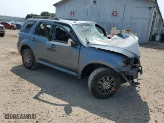 2010 Mercury Mariner with VIN 4M2CN8BG8AKJ18899, listed as a Copart auction lot 64751414 with 0 mi miles and Clean Title. Bid and sale history available at carsss.com. Image 4.