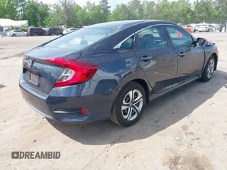 2018 Honda Civic LX with VIN 2HGFC2F53JH560402, listed as a IAAI auction lot 42152391 with 75,384 mi miles and . Bid and sale history available at DreamBid. Image 4.