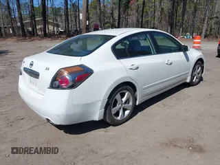 2011 Nissan Altima S with VIN 1N4AL2APXBN465996, listed as a IAAI auction lot 41907608 with 210,702 mi miles and . Bid and sale history available at DreamBid. Image 4.