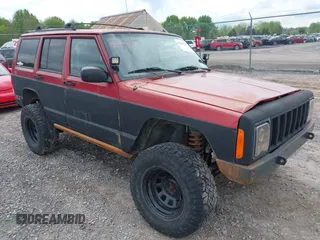 1999 Jeep Cherokee Sport z VIN 1J4FF68SXXL670160, wystawiony jako IAAI lot #42265237 z przebiegiem 197 390 mil mil oraz . Historia ofert i sprzedaży dostępna na DreamBid. Obrazek 1.