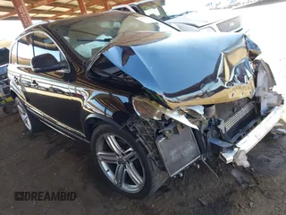2015 Audi Q7 Premium Plus z VIN WA1LGAFE2FD033059, wystawiony jako IAAI lot #42314260 z przebiegiem 145 009 mil mil oraz . Historia ofert i sprzedaży dostępna na DreamBid. Obrazek 1.