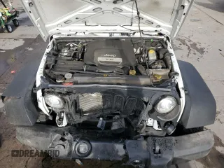 2018 Jeep Wrangler Sport S with VIN 1C4AJWAG1JL884708, listed as a Copart auction lot 82643804 with 80,002 mi miles and Salvage title. Bid and sale history available at DreamBid. Image 12.
