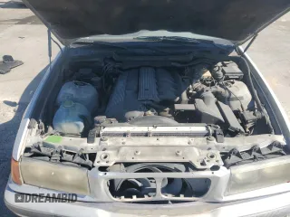 1998 BMW 3 Series 328iA with VIN WBACD4326WAV64466, listed as a Copart auction lot 74957534 with 152,963 mi miles and Salvage Title. Bid and sale history available at carsss.com. Image 11.