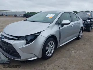 2024 Toyota Corolla Hybrid LE with VIN JTDBCMFE2R3044233, listed as a IAAI auction lot 40063454 with 6,855 mi miles. Bid and sale history available at carsss.com. Image 2.