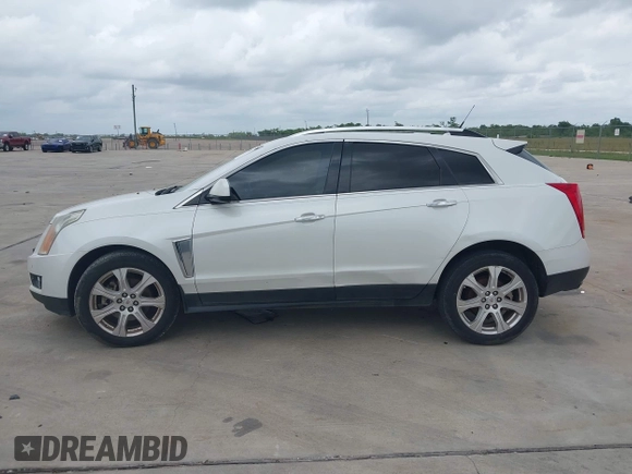 2014 Cadillac SRX Premium Collection with VIN 3GYFNDE31ES615995, listed as a IAAI auction lot 42148943 with 232,752 mi miles and . Bid and sale history available at DreamBid. Image 14.