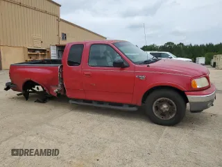 2002 Ford F-150 XL with VIN 2FTRX08L02CA02800, listed as a Copart auction lot 56494315 with 350,842 mi miles and Salvage title. Bid and sale history available at DreamBid. Image 4.