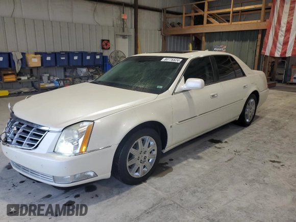 2009 Cadillac DTS 1SC z VIN 1G6KD57Y59U118737, wystawiony jako Copart lot #80776524 z przebiegiem 123 001 mil mil oraz Szkoda całkowita • Salvage title. Historia ofert i sprzedaży dostępna na DreamBid. Obrazek 1.