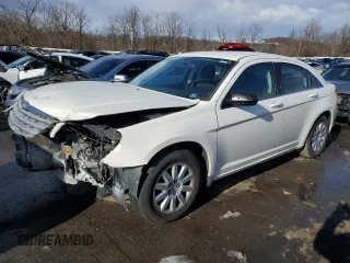 2010 Chrysler Sebring Touring with VIN 1C3CC4FB3AN123448, listed as a Copart auction lot 82329464 with 0 mi miles and Salvage Title. Bid and sale history available at carsss.com. Image 1.