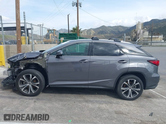 2020 Lexus RX with VIN 2T2HZMAA3LC153100, listed as a IAAI auction lot 41925188 with 104,216 mi miles. Bid and sale history available at carsss.com. Image 14.