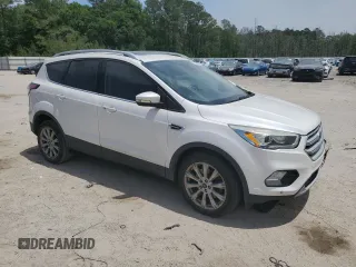 2018 Ford Escape Titanium with VIN 1FMCU0J99JUA06741, listed as a Copart auction lot 55782195 with 103,392 mi miles and Salvage title. Bid and sale history available at DreamBid. Image 4.