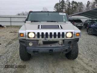 2004 Hummer H2 with VIN 5GRGN23U24H118230, listed as a Copart auction lot 87764075 with 202,206 mi miles and Salvage Title. Bid and sale history available at carsss.com. Image 5.