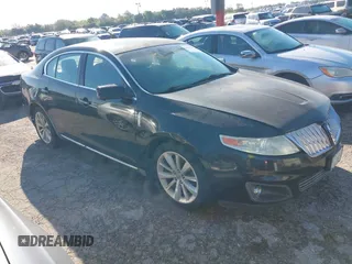 2009 Lincoln MKS with VIN 1LNHM94RX9G607947, listed as a IAAI auction lot 41644221 with 184,979 mi miles. Bid and sale history available at carsss.com. Image 1.
