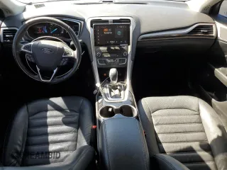 2016 Ford Fusion Energi SE Luxury with VIN 3FA6P0PU0GR348704, listed as a Copart auction lot 51478595 with 89,910 mi miles and Salvage Title. Bid and sale history available at carsss.com. Image 8.