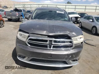 2016 Dodge Durango SXT with VIN 1C4RDJAGXGC415929, listed as a Copart auction lot 52812635 with 202,456 mi miles and Salvage title. Bid and sale history available at DreamBid. Image 5.
