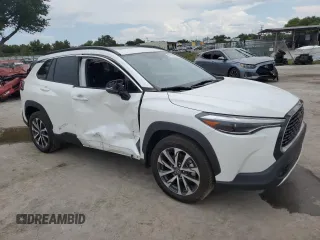 2023 Toyota Corolla Cross XLE z VIN 7MUDAAAG7PV051492, wystawiony jako Copart lot #61185635 z przebiegiem 79 364 mil mil oraz Nie do naprawy • Non repairable. Historia ofert i sprzedaży dostępna na DreamBid. Obrazek 4.