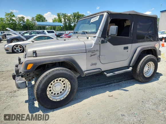 2001 Jeep Wrangler Sport with VIN 1J4FA49S21P374356, listed as a Copart auction lot 63568695 with 202,853 mi miles and Clean title. Bid and sale history available at DreamBid. Image 1.