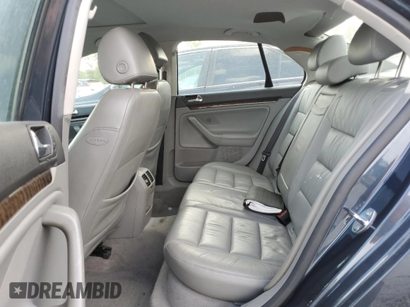2005 Volkswagen Jetta 2.5L with VIN 3VWDG71K65M606300, listed as a Copart auction lot 57848515 with 108,928 mi miles and Salvage title. Bid and sale history available at DreamBid. Image 10.