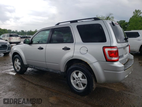2010 Ford Escape XLS with VIN 1FMCU9C78AKD21851, listed as a Copart auction lot 61444945 with 70,404 mi miles and Clean title. Bid and sale history available at DreamBid. Image 2.