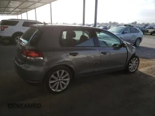 2014 Volkswagen Golf TDI w/Sunroof & Nav z VIN WVWDM7AJ9EW000668, wystawiony jako Copart lot #48564565 z przebiegiem 28 578 mil mil oraz Szkoda całkowita • Salvage title. Historia ofert i sprzedaży dostępna na DreamBid. Obrazek 3.