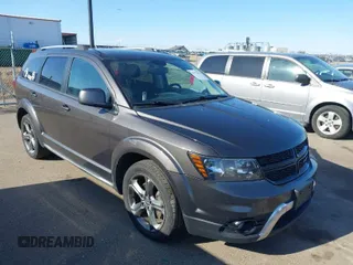 2016 Dodge Journey Crossroad Plus z VIN 3C4PDDGGXGT135934, wystawiony jako IAAI lot #41976026 z przebiegiem 141 181 mil mil oraz . Historia ofert i sprzedaży dostępna na DreamBid. Obrazek 1.