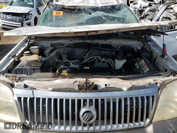 2002 Mercury Mountaineer z VIN 4M2ZU86E32ZJ27444, wystawiony jako Copart lot #75109744 z przebiegiem 194 298 mil mil oraz Szkody całkowita. Historia ofert i sprzedaży dostępna na DreamBid. Obrazek 12.