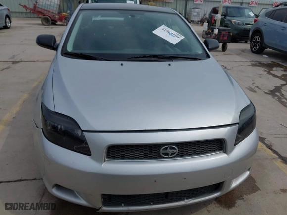2006 Scion tC with VIN JTKDE177960125897, listed as a IAAI auction lot 41964589 with 215,443 mi miles. Bid and sale history available at carsss.com. Image 12.
