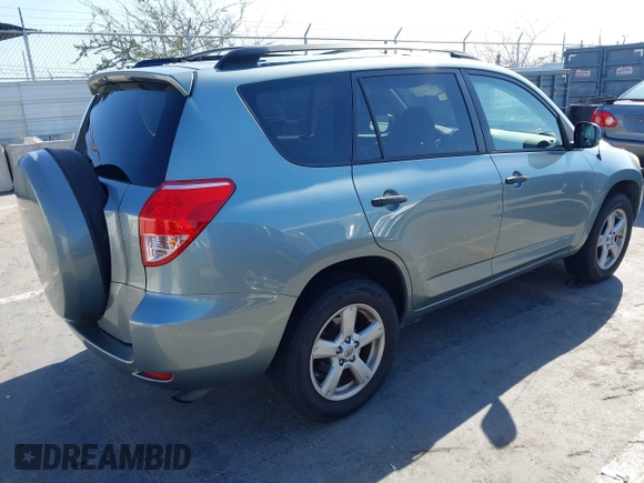 2006 Toyota RAV4 with VIN JTMZD33V465012121, listed as a IAAI auction lot 42013354 with 214,726 mi miles. Bid and sale history available at carsss.com. Image 4.