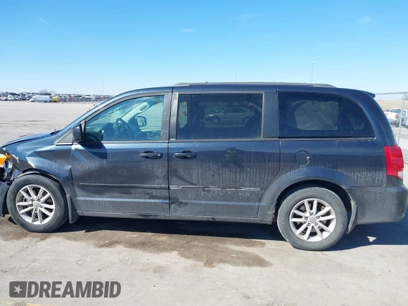 2014 Dodge Grand Caravan SXT with VIN 2C4RDGCG1ER167624, listed as a IAAI auction lot 41888822 with 202,729 mi miles and . Bid and sale history available at DreamBid. Image 14.