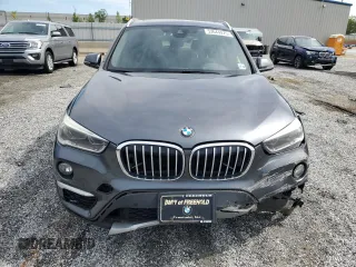 2016 BMW X1 xDrive28i z VIN WBXHT3C37GP888364, wystawiony jako Copart lot #53644975 z przebiegiem 119 725 mil mil oraz Szkoda całkowita • Salvage title. Historia ofert i sprzedaży dostępna na DreamBid. Obrazek 5.
