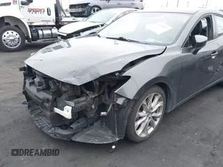 2014 Mazda 3 s Touring with VIN JM1BM1L35E1208952, listed as a IAAI auction lot 42121077 with 183,985 mi miles. Bid and sale history available at carsss.com. Image 6.