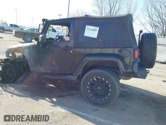 2011 Jeep Wrangler Sahara with VIN 1J4AA5D14BL514060, listed as a IAAI auction lot 41142809 with Not Provided miles and . Bid and sale history available at DreamBid. Image 3.