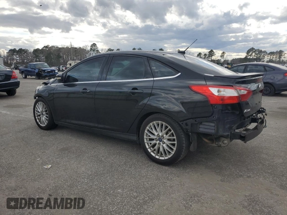 2014 Ford Focus Titanium with VIN 1FADP3J22EL221898, listed as a Copart auction lot 47867325 with 97,806 mi miles and Salvage Title. Bid and sale history available at DreamBid. Image 2.