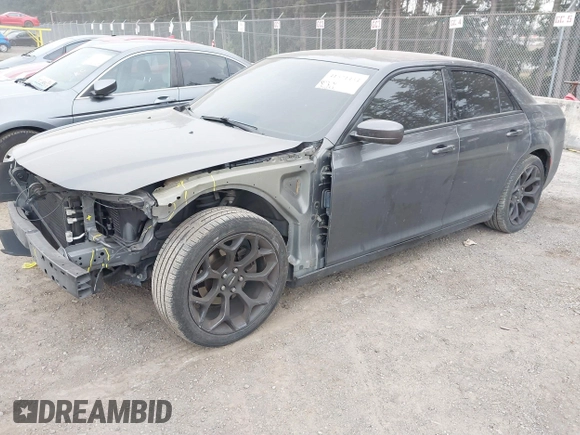 2019 Chrysler 300 S with VIN 2C3CCABG8KH601034, listed as a IAAI auction lot 41571454 with 104,632 mi miles and . Bid and sale history available at DreamBid. Image 18.