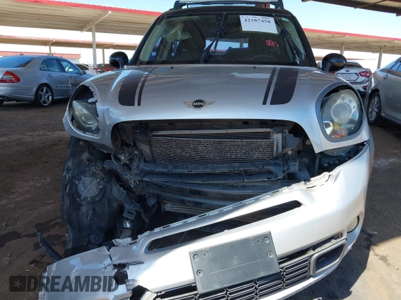 2014 MINI Countryman S with VIN WMWZC3C56EWP27328, listed as a IAAI auction lot 42187458 with 140,616 mi miles and . Bid and sale history available at DreamBid. Image 13.