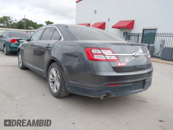 2015 Ford Taurus SEL with VIN 1FAHP2E8XFG161616, listed as a IAAI auction lot 42049199 with 138,565 mi miles and . Bid and sale history available at carsss.com. Image 3.