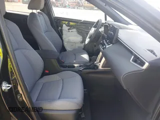 2025 Toyota Corolla Cross Hybrid S with VIN 7MUFBABG6SV066112, listed as a IAAI auction lot 42263992 with 1,684 mi miles and . Bid and sale history available at DreamBid. Image 5.